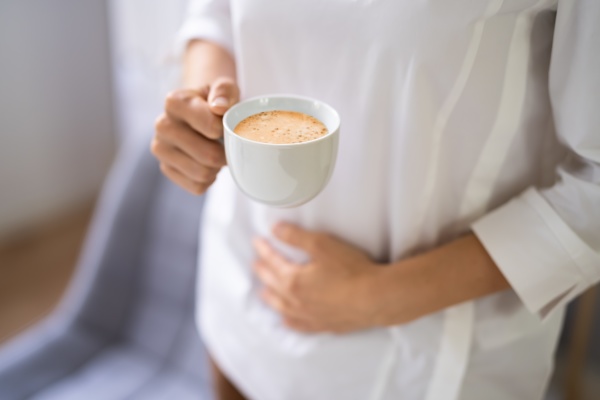 Bauchschmerzen Und Schmerzen Durch Kaffee Lizenzfreies Foto 30855796