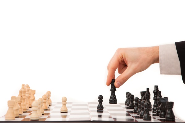 schach stück schwarz auf dem schachbrett weißen - Stockfoto