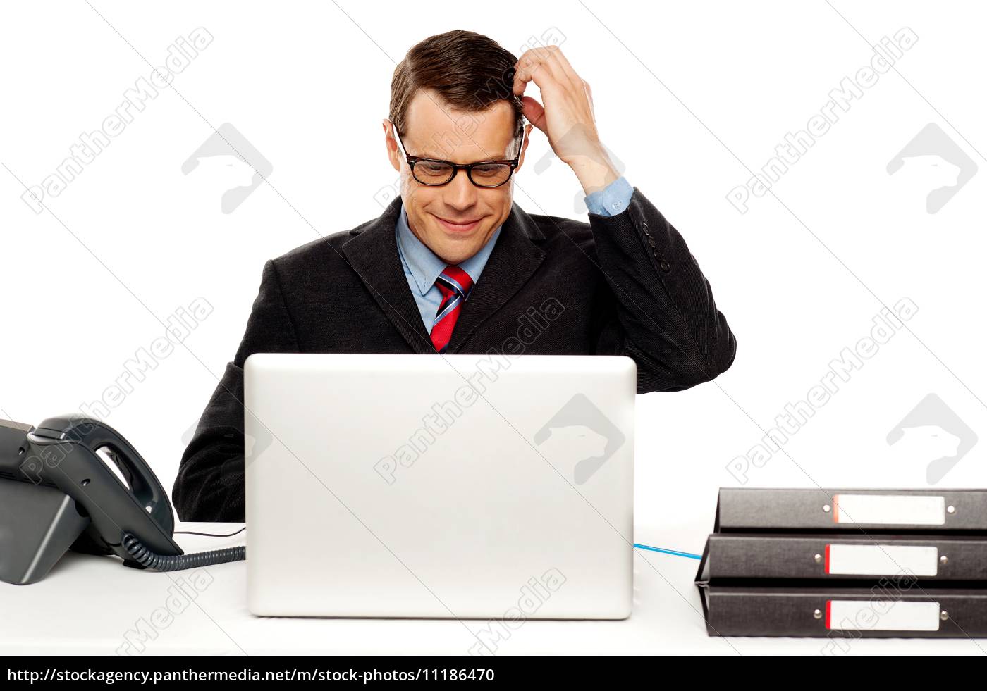 confused-male-manager-itching-his-head-stock-photo-11186470