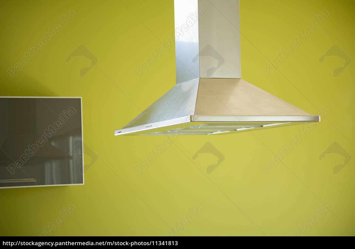 Overhead Stovetop Fan And Green Wall In Modern Kitchen Lizenzfreies   ~overhead Stovetop Fan And Green Wall 11341813 High 