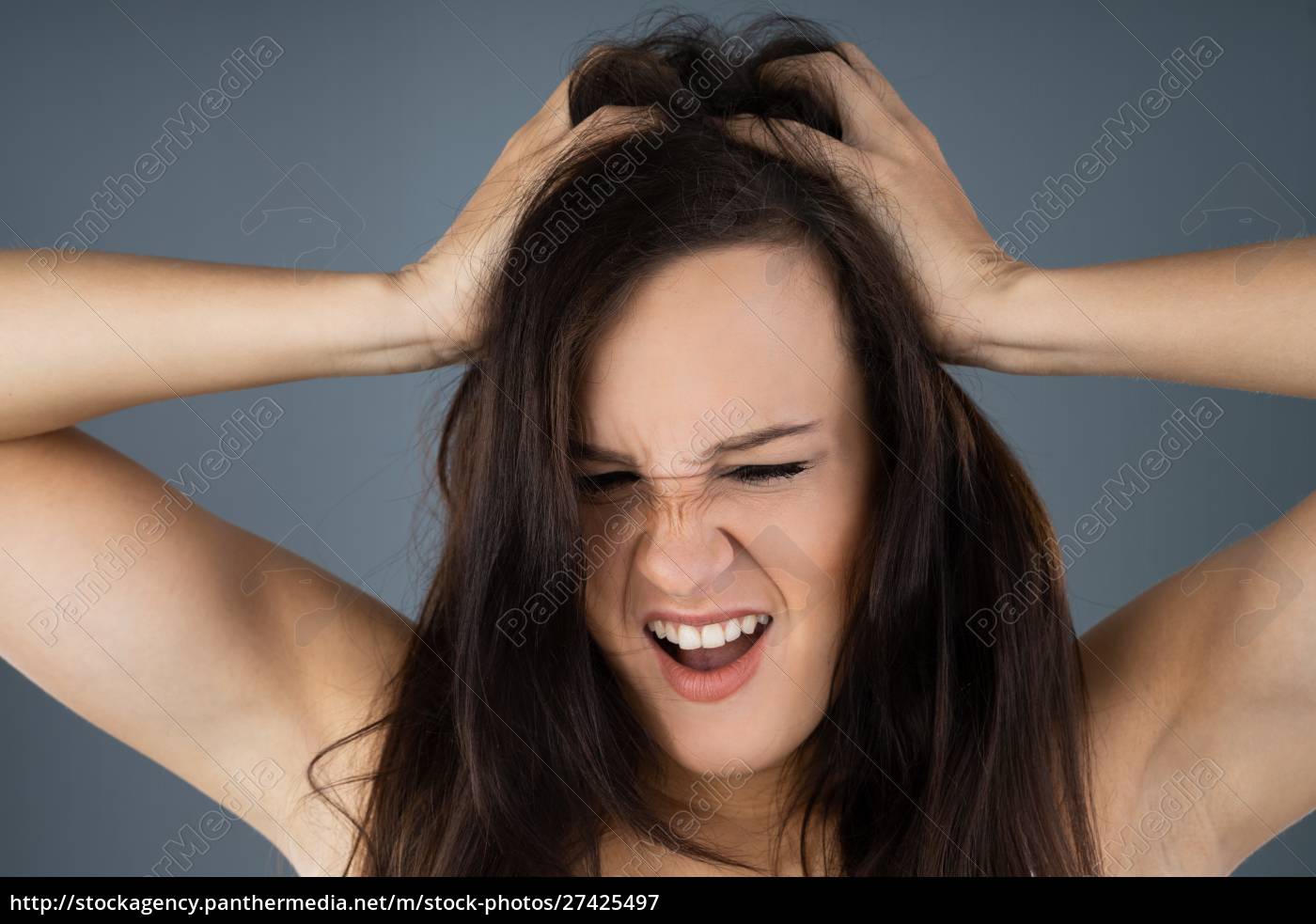 Woman Scratching Her Itchy Head Lizenzfreies Bild 27425497